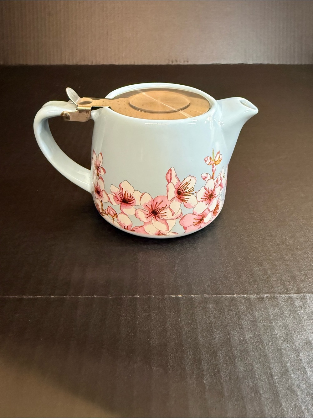 Ceramic and stainless steel teapot